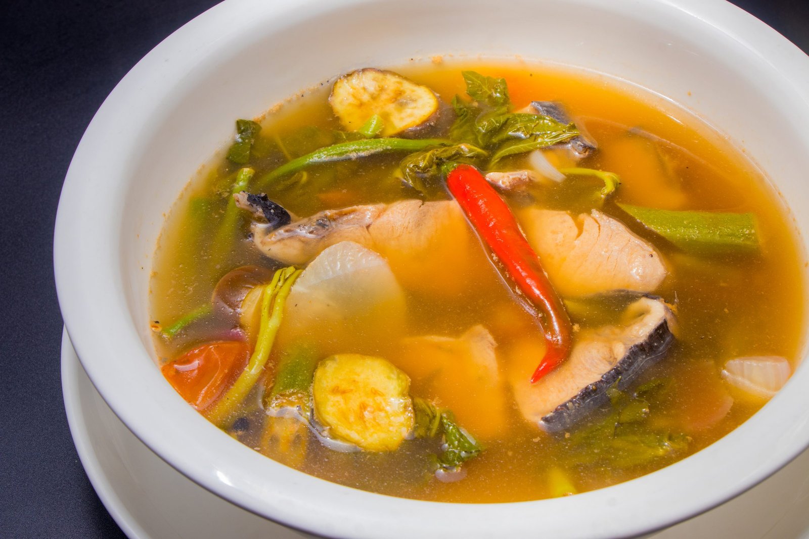 Fish sinigang with radish, string beans and chili